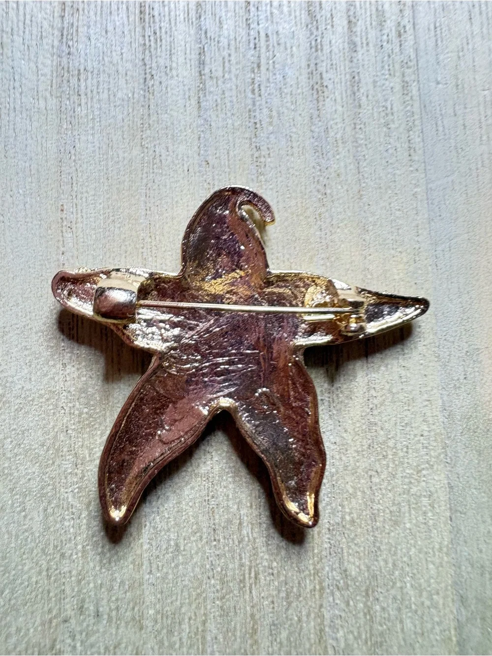 Gold Starfish Brooch with Blue Crystal Accents and Pearl Detail